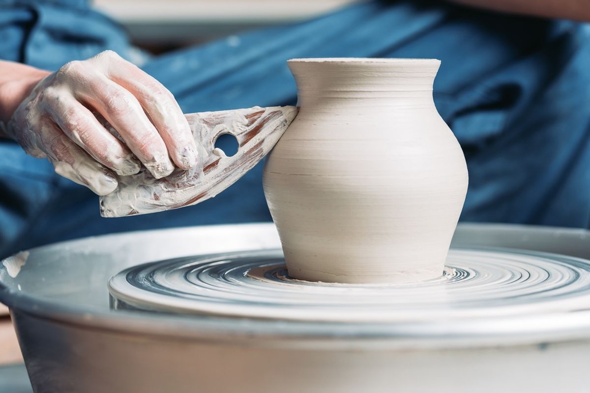 Women using a potter's wheel