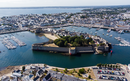 Aerial view of Concarneau, a medieval walled city in Brittany, France - Sandy beach under the fortifications of this island located in a bay along the coast of the Atlantic Ocean