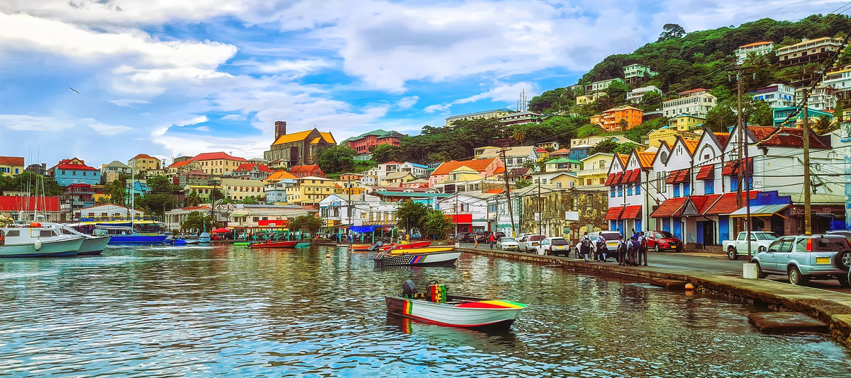 Inner harbor in St Georges with Cathedral of the Immaculate Conception beyond, Grenada, West Indies