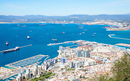 Aerial view of Gibraltar, Algeciras Bay and La Linea de la Concepcion from the Upper Rock. View on coastal city from above.