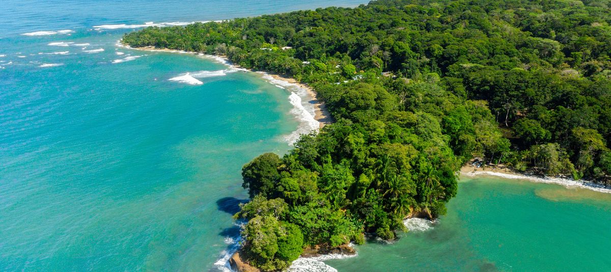 Aerial View of Punta Uva Beach, surrounding forests and cliffs, near Puerto Viejo, Limón Province, Costa Rica.