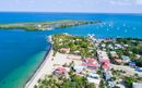 Aerial View of Placencia Village in Southern Belize. Caribbean Sea and beaches.