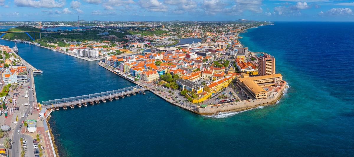 Willemstad historic city center aerial view including Otrobanda on the left and Punda on the right in city of Willemstad, Curacao.