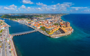 Willemstad historic city center aerial view including Otrobanda on the left and Punda on the right in city of Willemstad, Curacao.